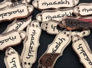 mirror rosegold black lettering